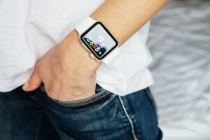 Female hand with modern smart Apple Watch