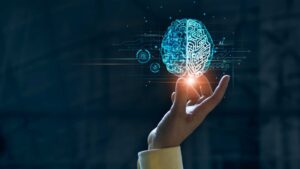 Cerveau digitale tenu dans la main d'un humain